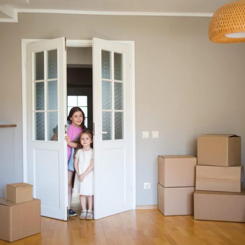 children-look-into-its-new-home-moving-to-apartment-boxes-in-house-1-1-pe7ens5euoxnfw6weepyx4ifht8bszjd5mhfpgym9s